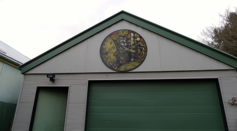 Picture protected by exterior varnish hung on Inner West garage